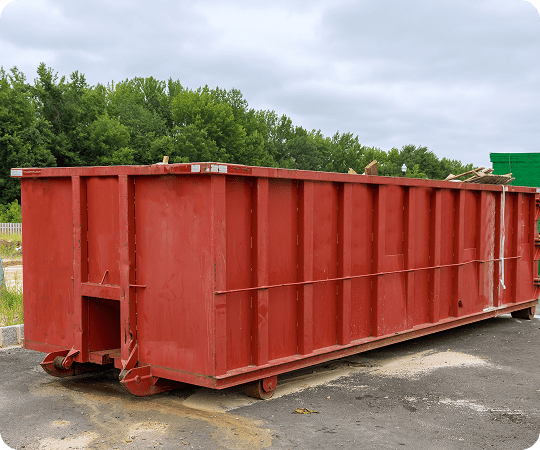 Red dumpster on construction site